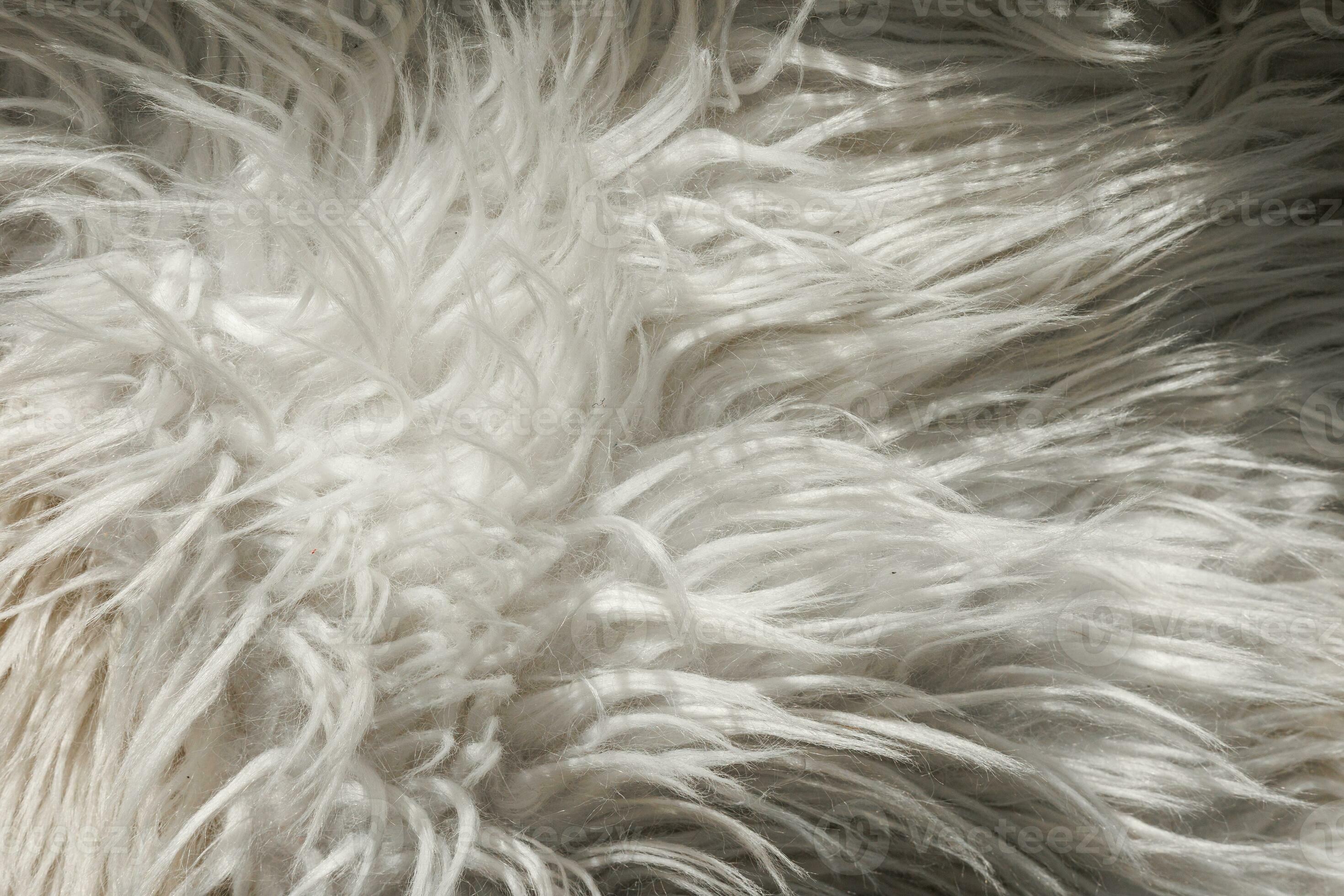 Close up artificial fluffy white grey fabric fur wool shaggy