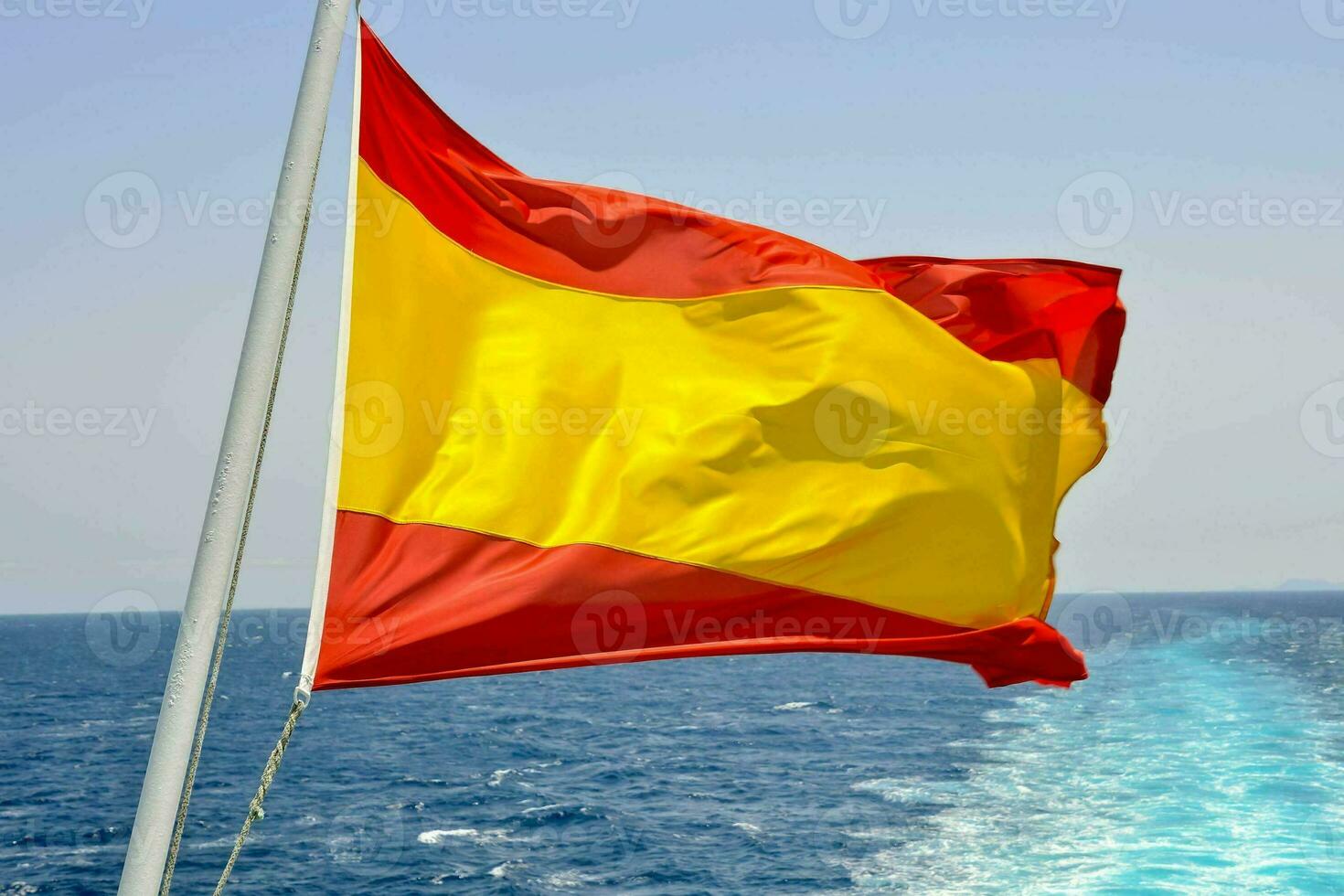 spanish flag on the sea photo