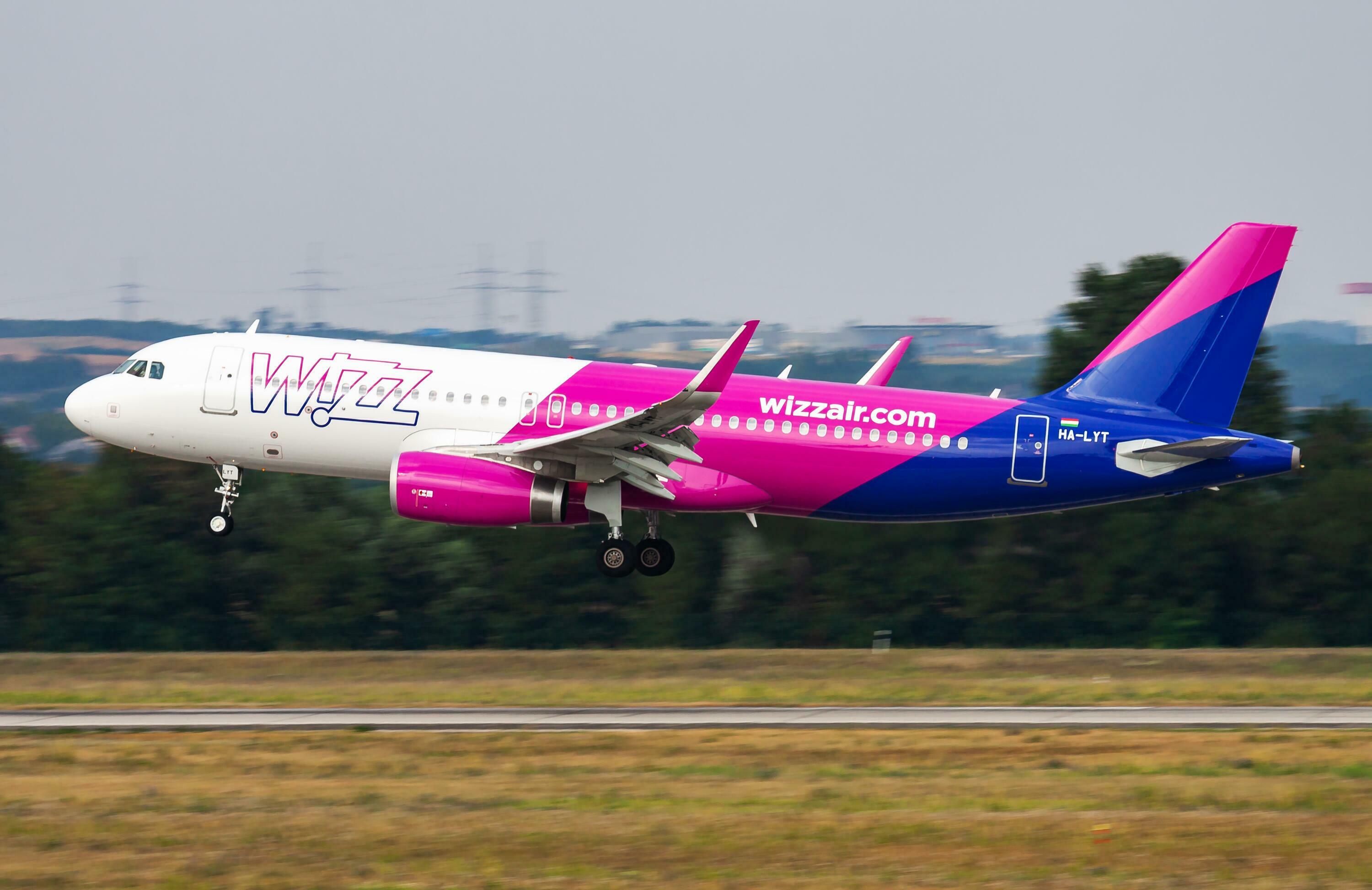 Wizz Air passenger plane at airport. Schedule flight travel. Aviation