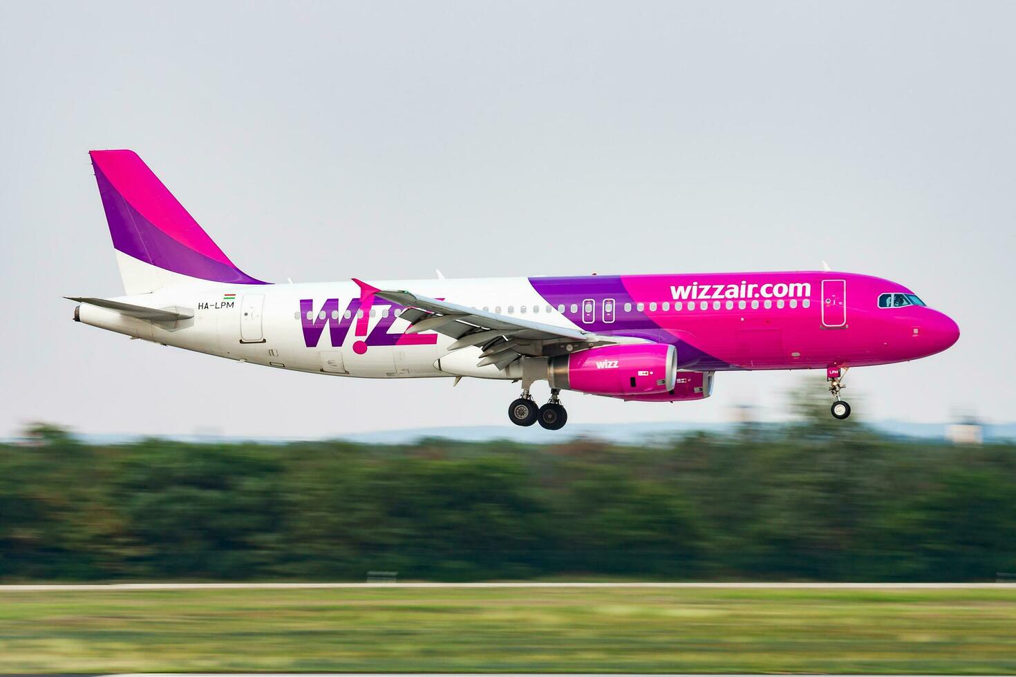 Wizz Air passenger plane at airport. Schedule flight travel. Aviation