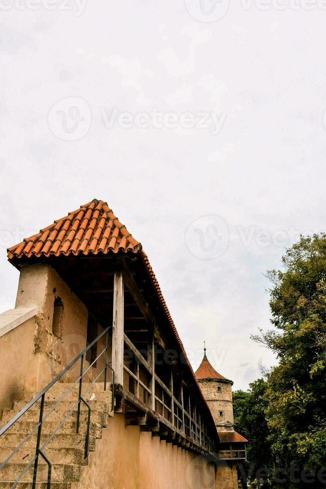 a walkway in an old city photo