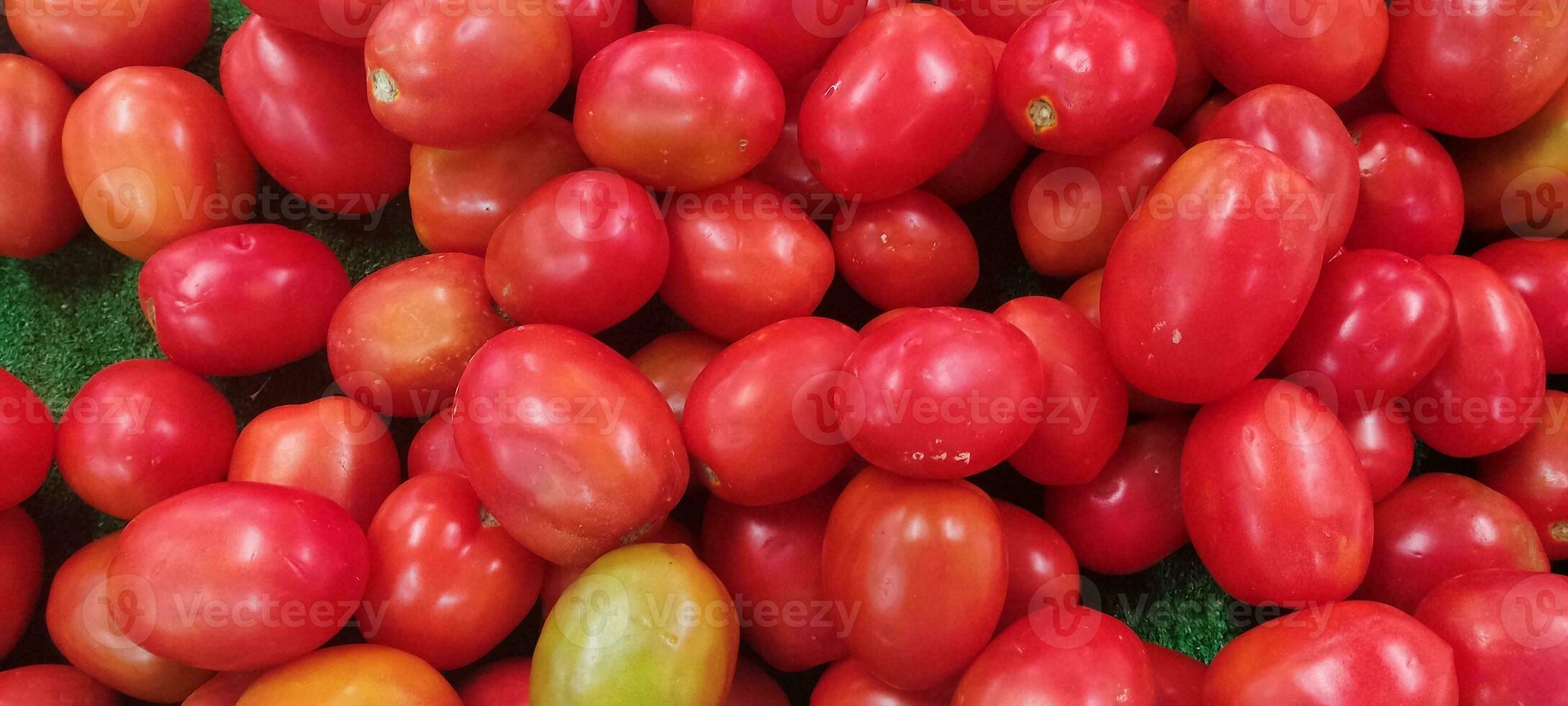 tomato background and texture fresh from market photo