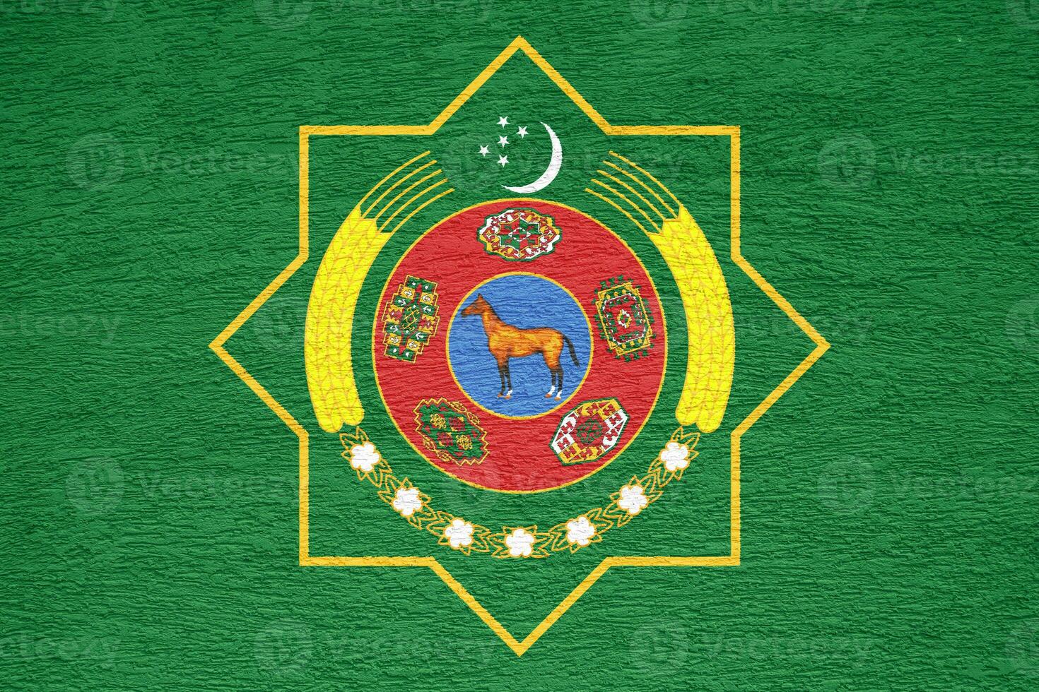 Flag and coat of arms of Turkmenistan on a textured background. Concept collage. photo