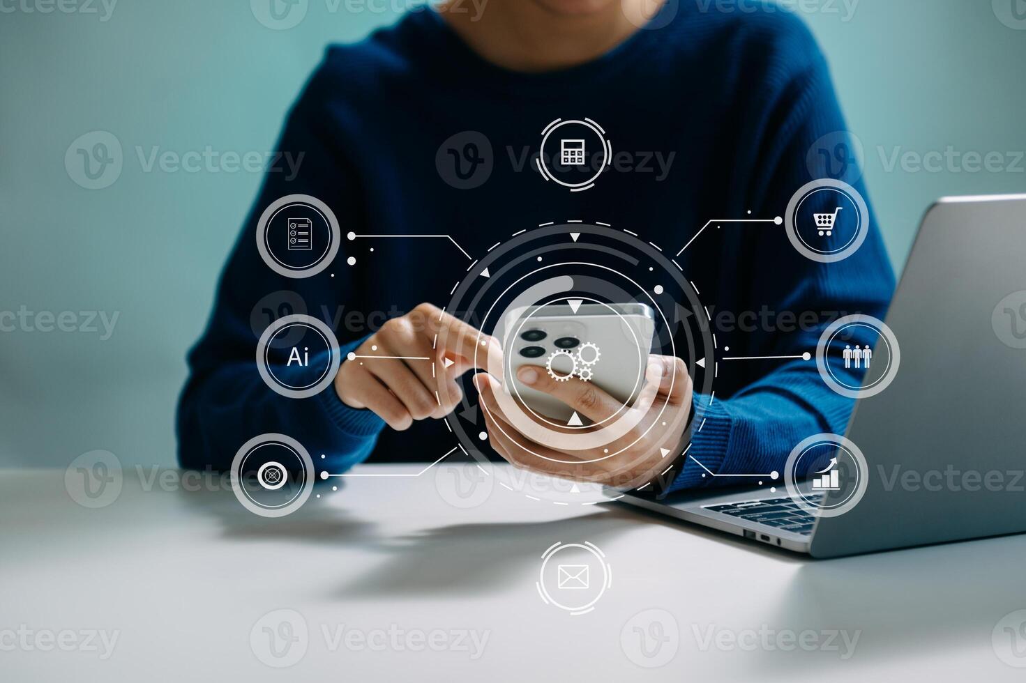 Businesswoman hand working digital marketing media in virtual screen with mobile phone and modern compute with VR icon diagram at office photo