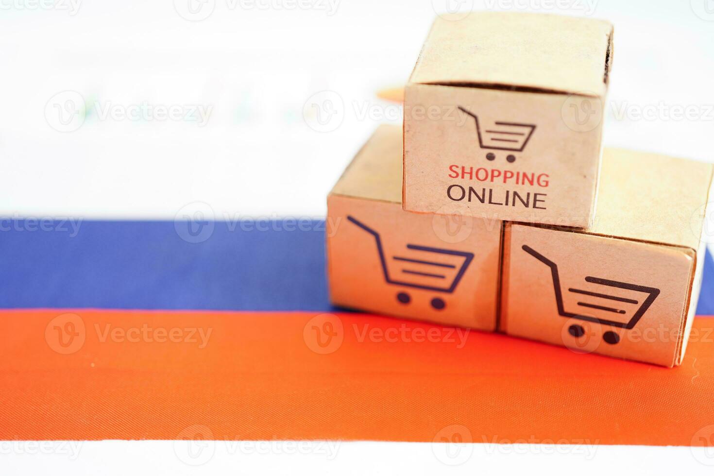 Online shopping, Shopping cart box on Russia flag, import export, finance commerce. photo