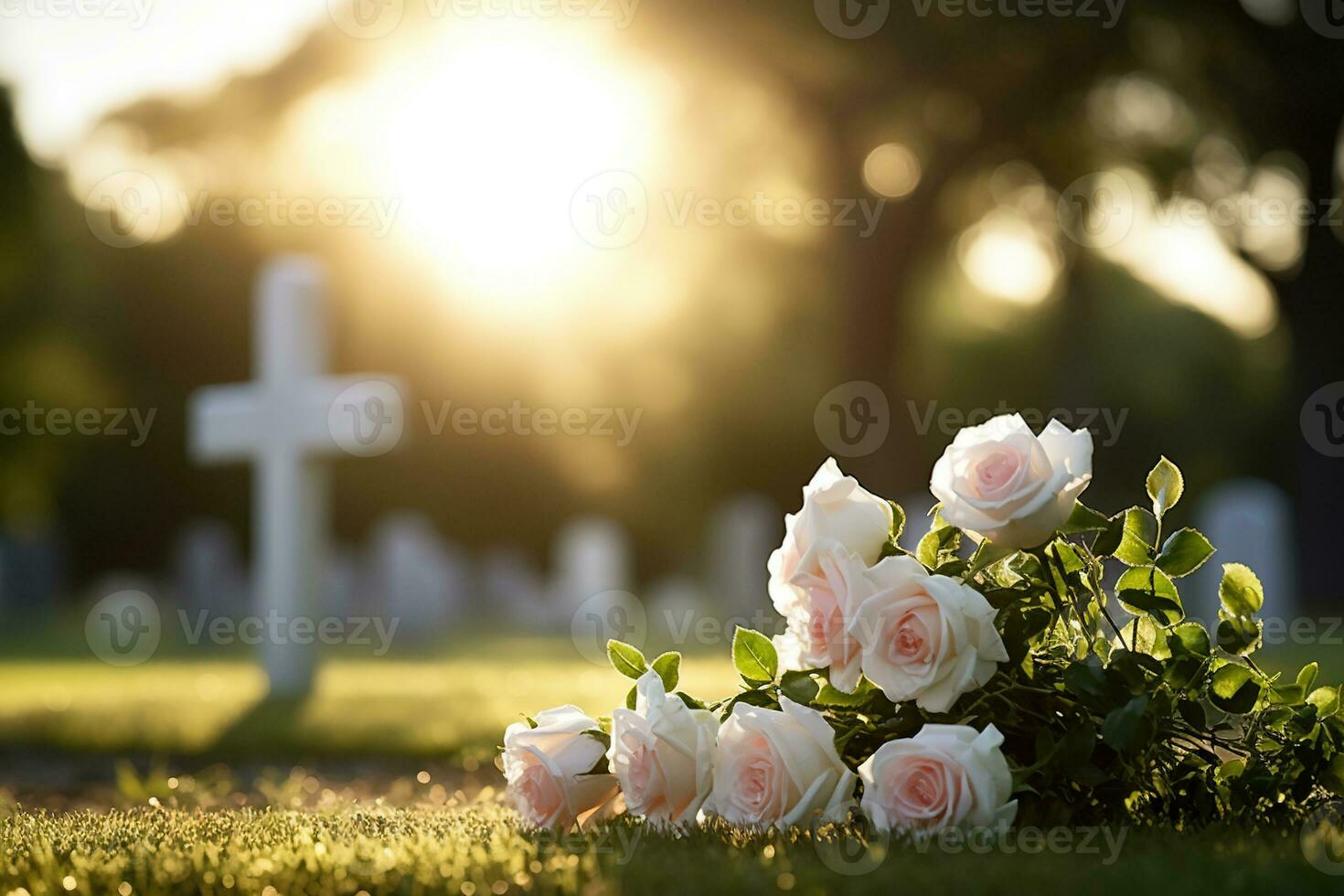 blanco flores en frente de un lápida sepulcral a un cementerio con atardecer.funeral concepto ai generado foto