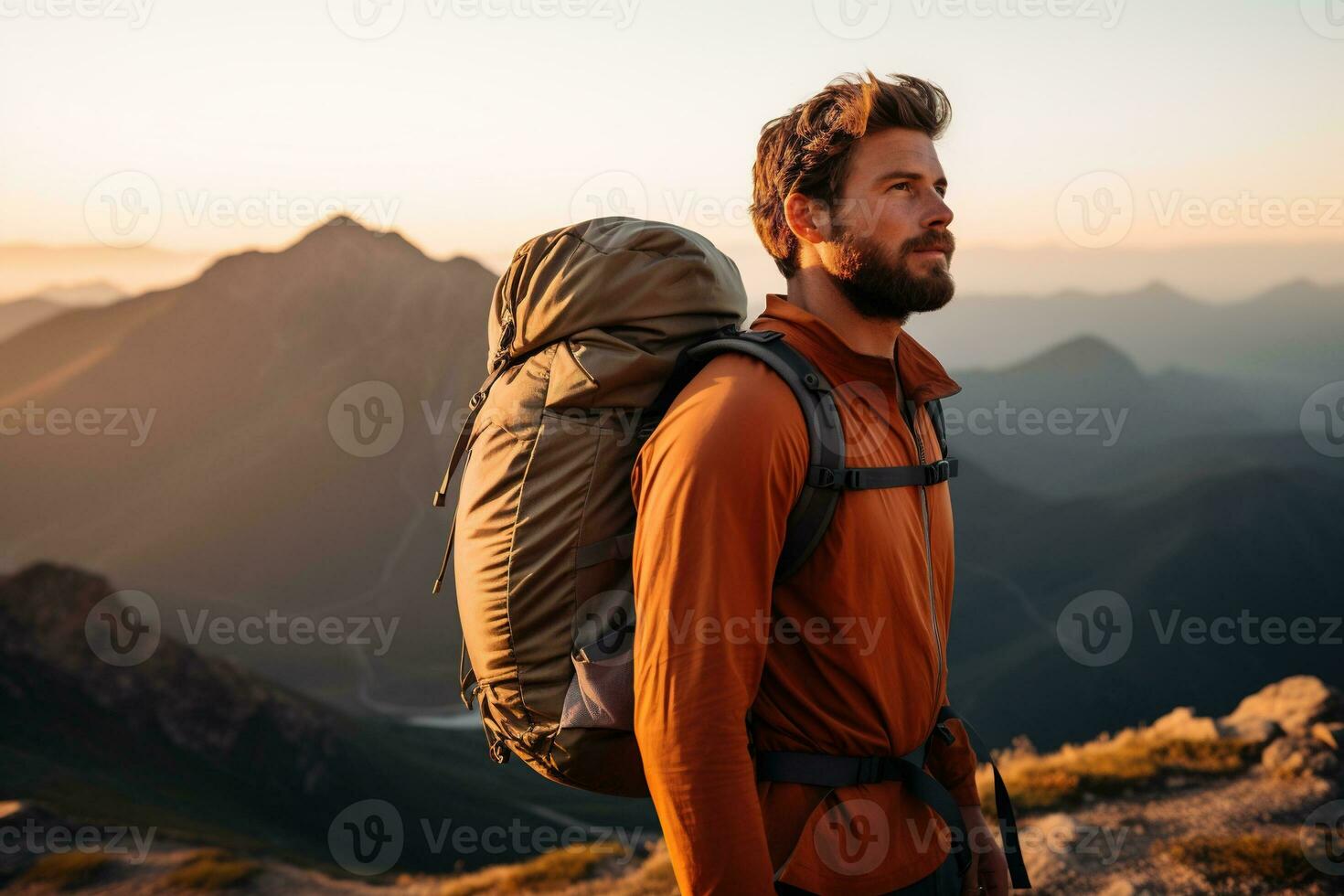 Handsome young man with backpack hiking in the mountains at sunset AI generated photo