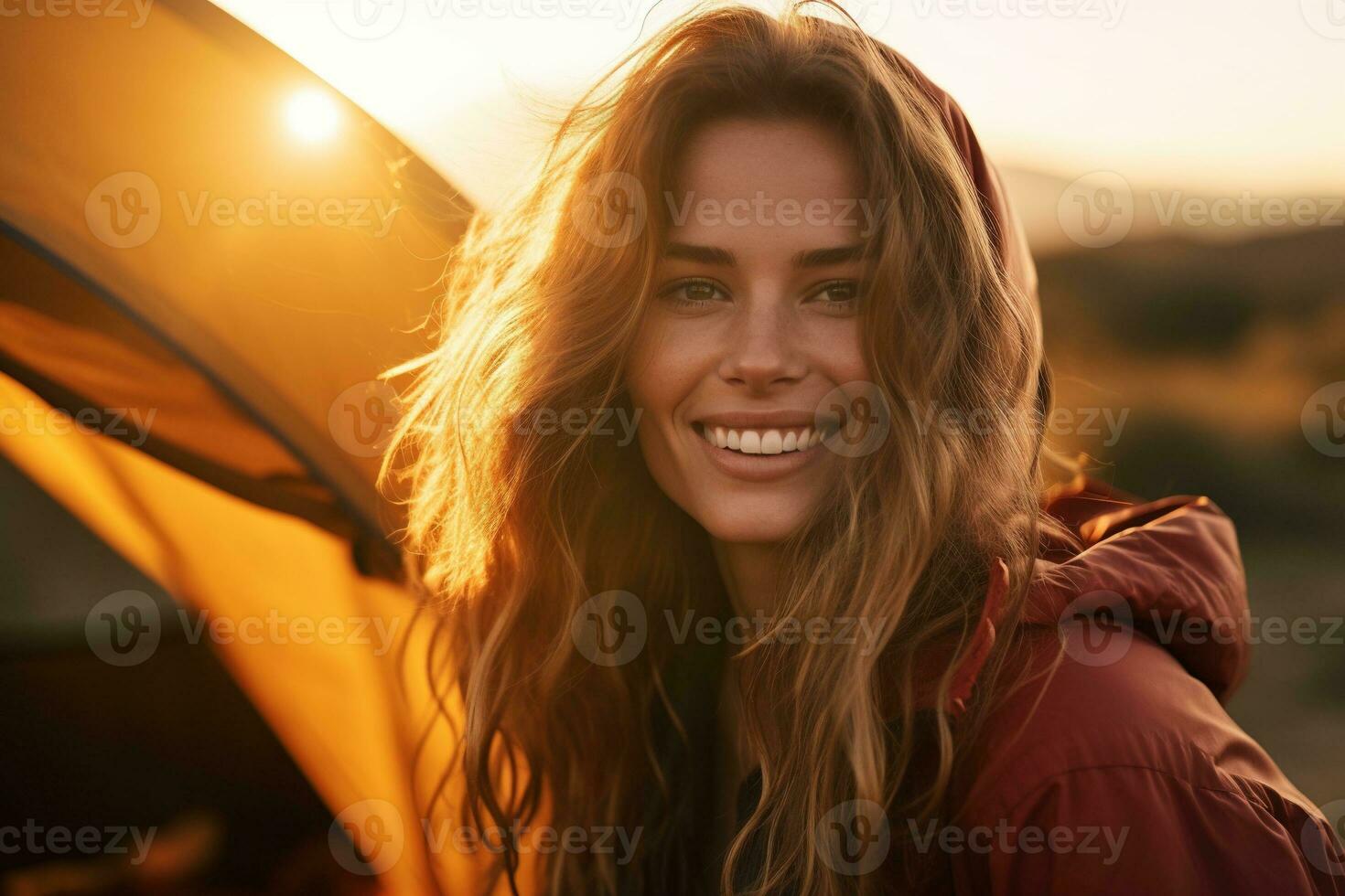 Portrait of girl looking at camera while near camping tent at sunset AI generated photo