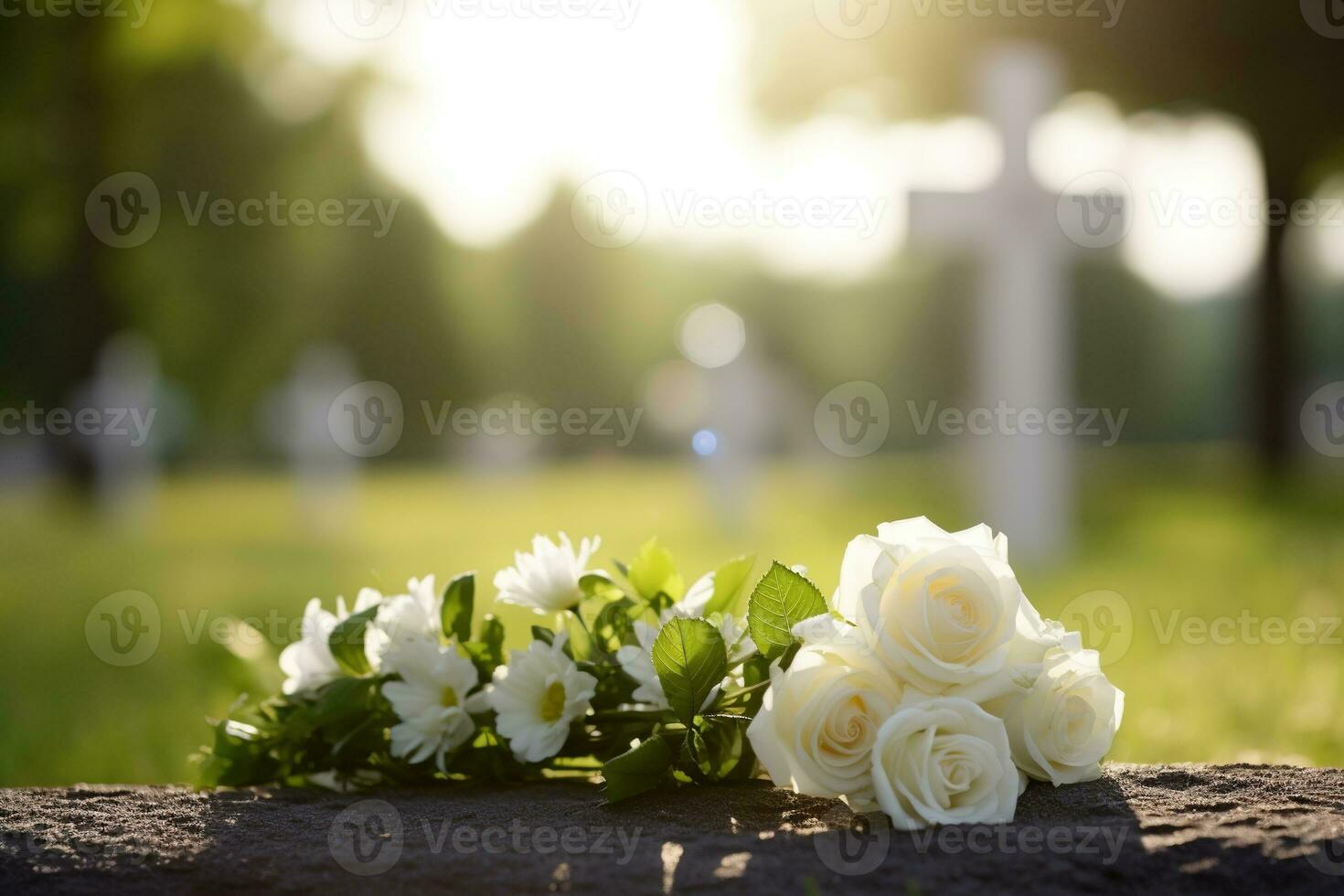 blanco flores en frente de un lápida sepulcral a un cementerio con atardecer.funeral concepto ai generado foto