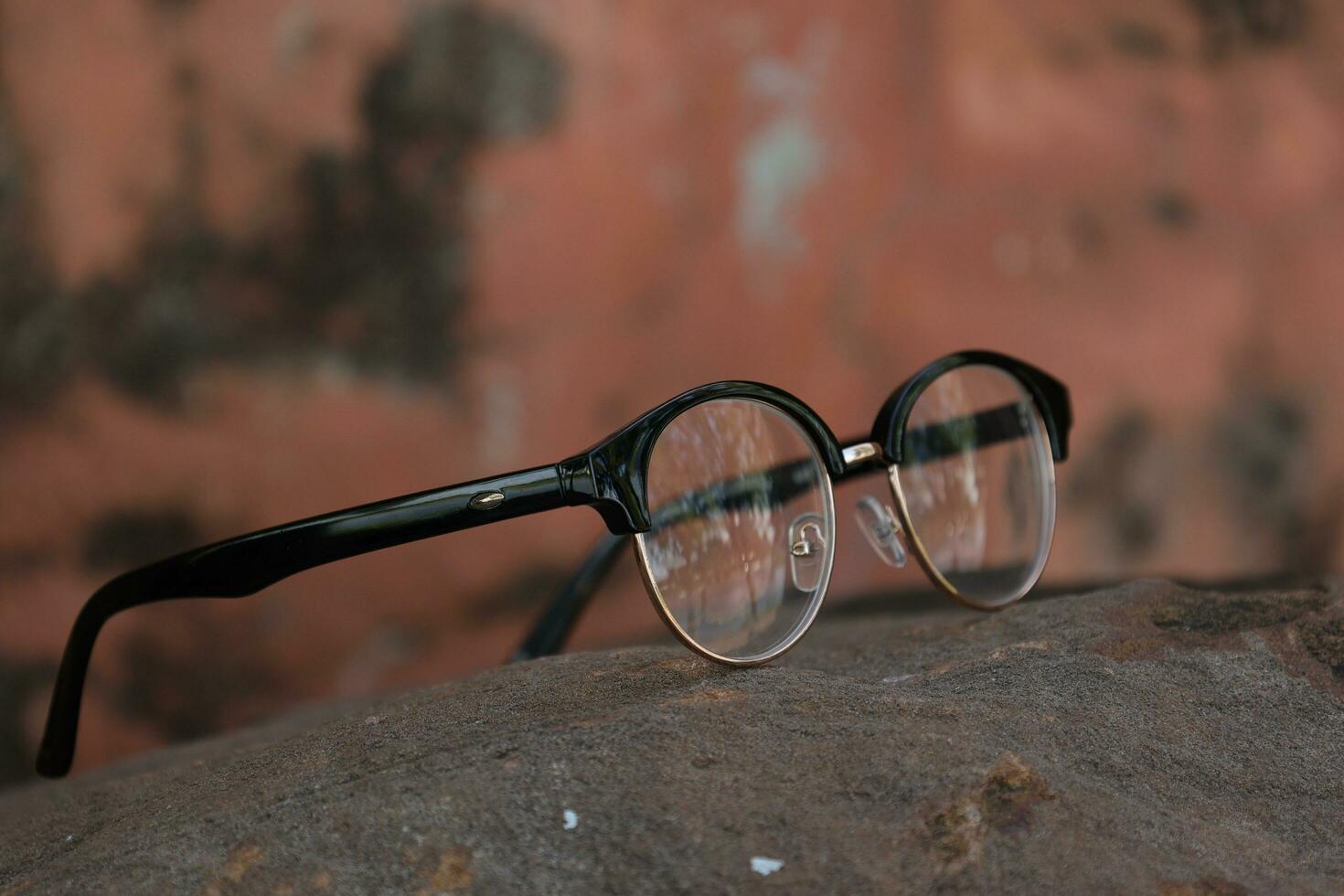Glasses on blur background photo