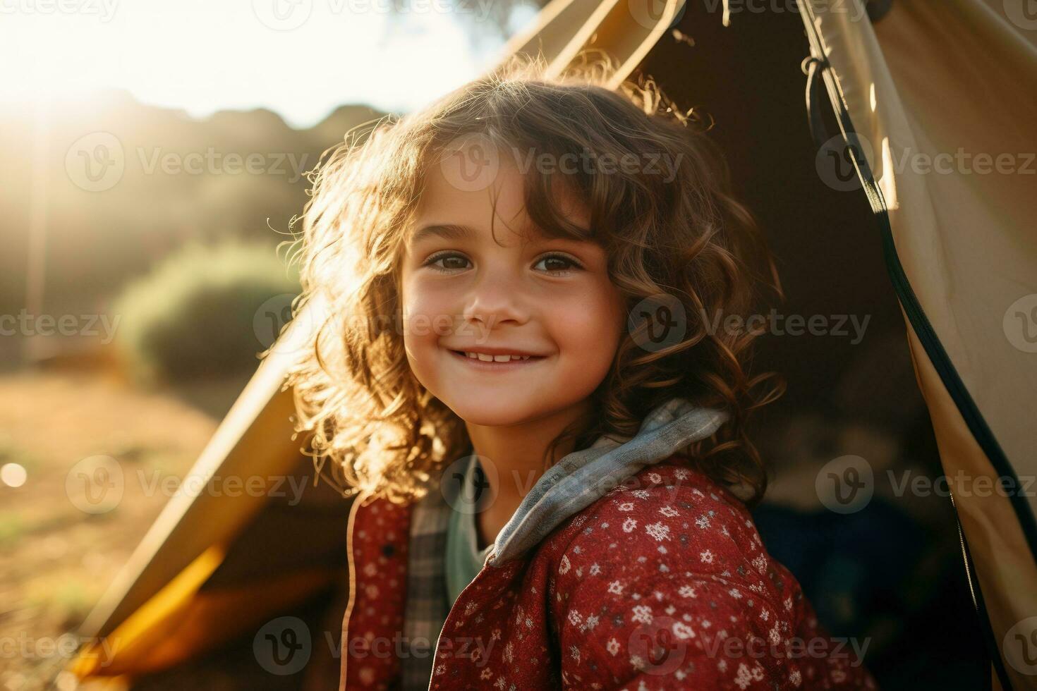 Portrait of cute little girl at camera while standing near camping tent at sunset AI generated photo