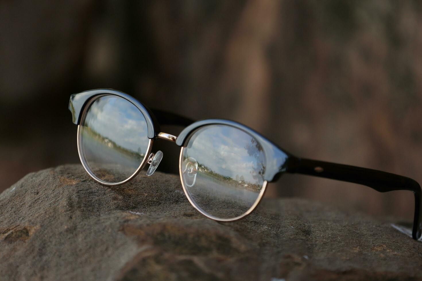 Glasses on blur background photo