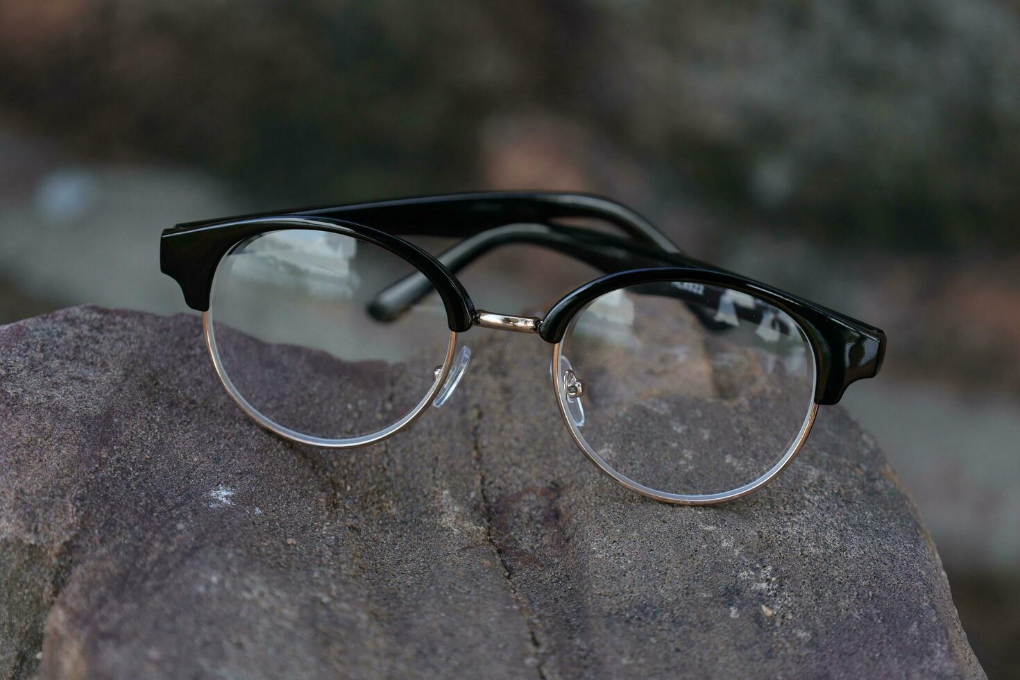 Glasses on blur background photo