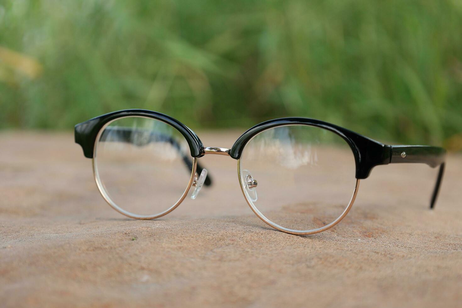 Glasses on blur background photo