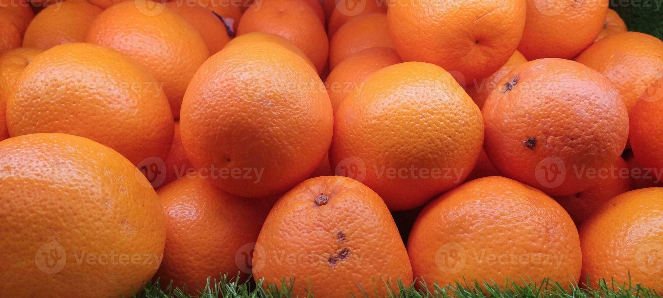 fresh orange fruits fresh from the market photo