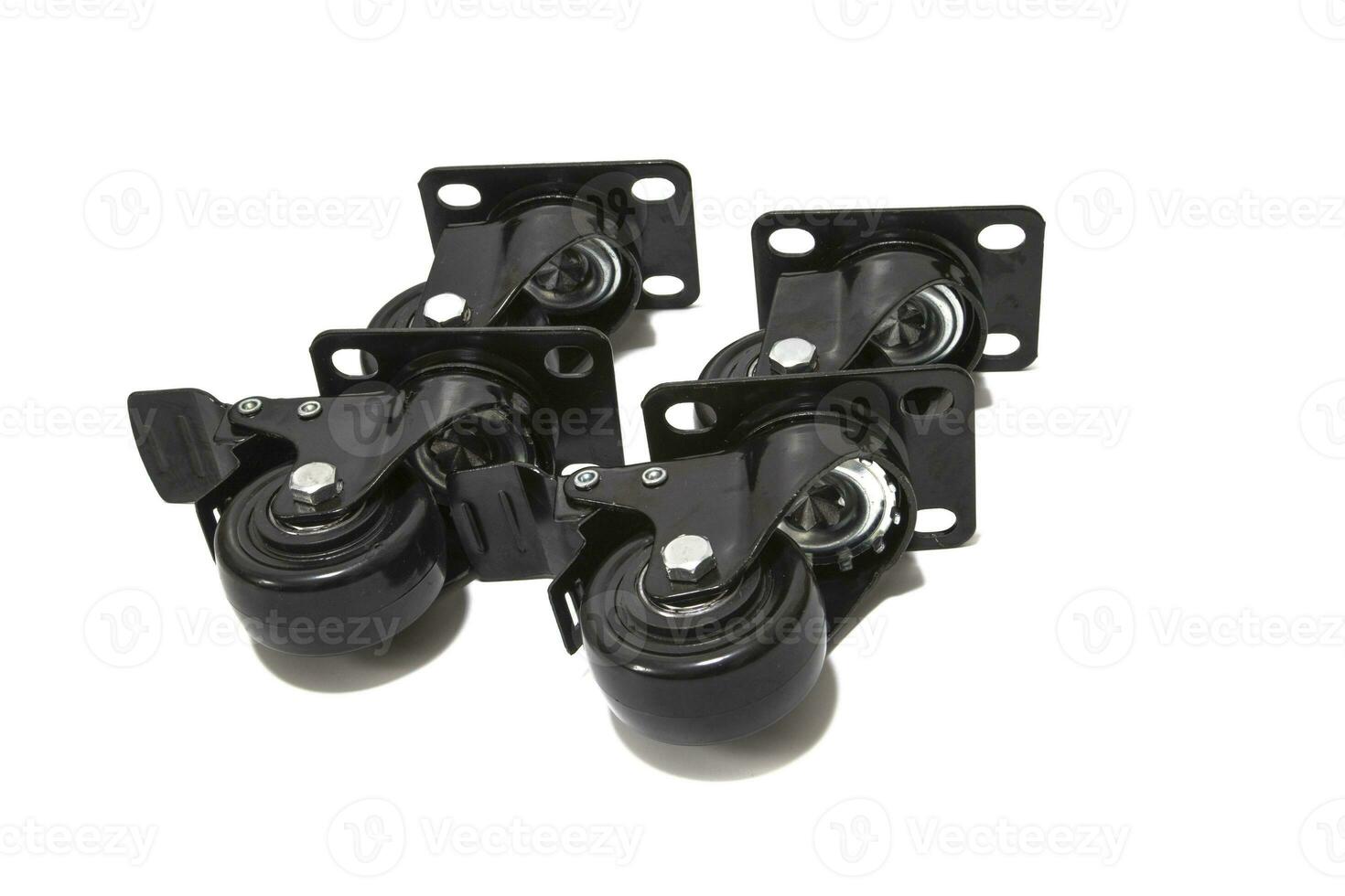 Black plastic furniture rollers on a black background. 21159659 Stock Photo  at Vecteezy