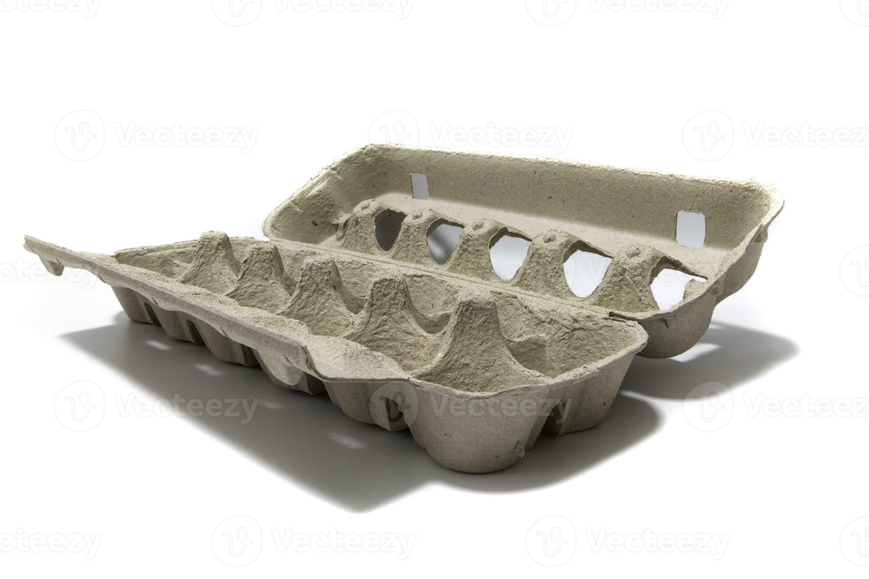 An egg carton container, for a dozen eggs. Isolated on a white