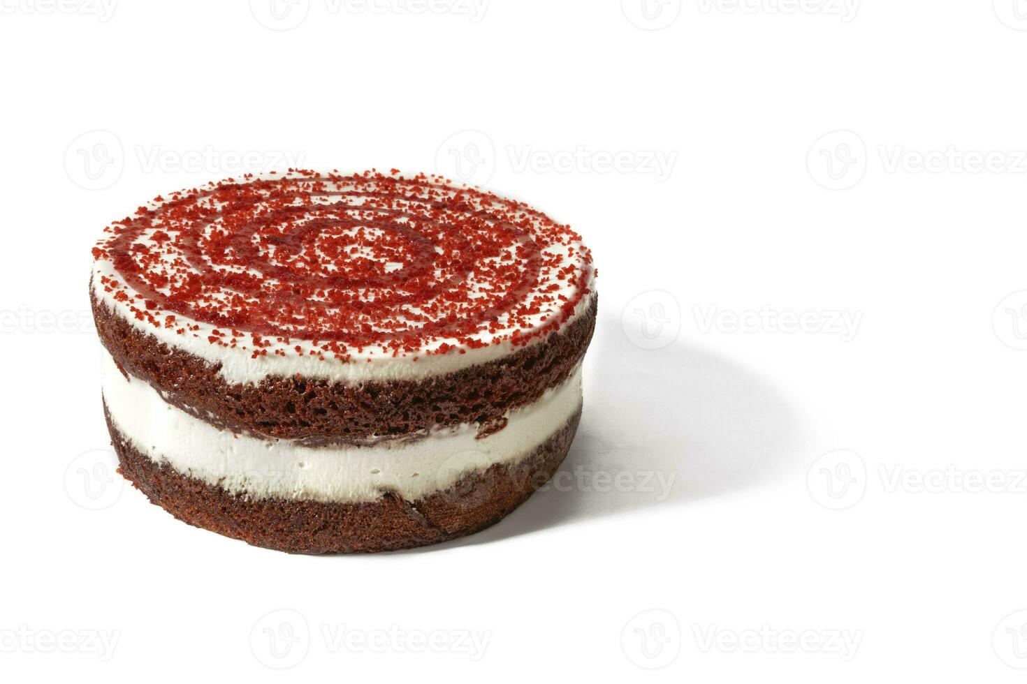 A red velvet cake, isolated on a white background. A red velvet cake is a soft red velvet treat with a perfect balance of sweet and tart, topped with a silky, creamy layer of cream cheese frosting. photo