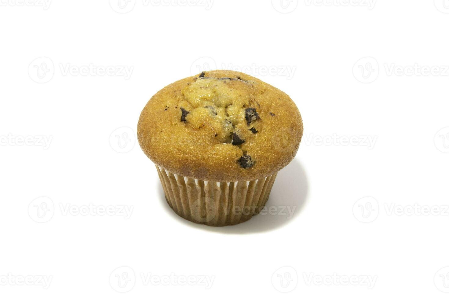 Muffins with chocolate flecks isolated on a white background. Muffins are made mainly from wheat flour, egg, vegetable oil, cow's milk, baking powder, essence ,vanilla being the most common, and sugar photo