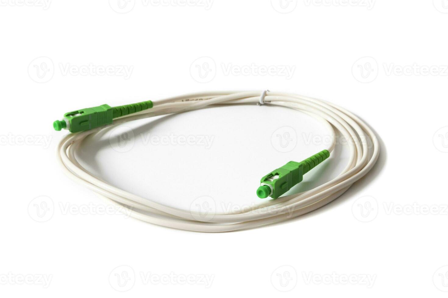 Fiber optic cable isolated on white background. Fiber optic cables are made of glass filaments, each with the capacity to transmit digital data modulated in light waves. photo