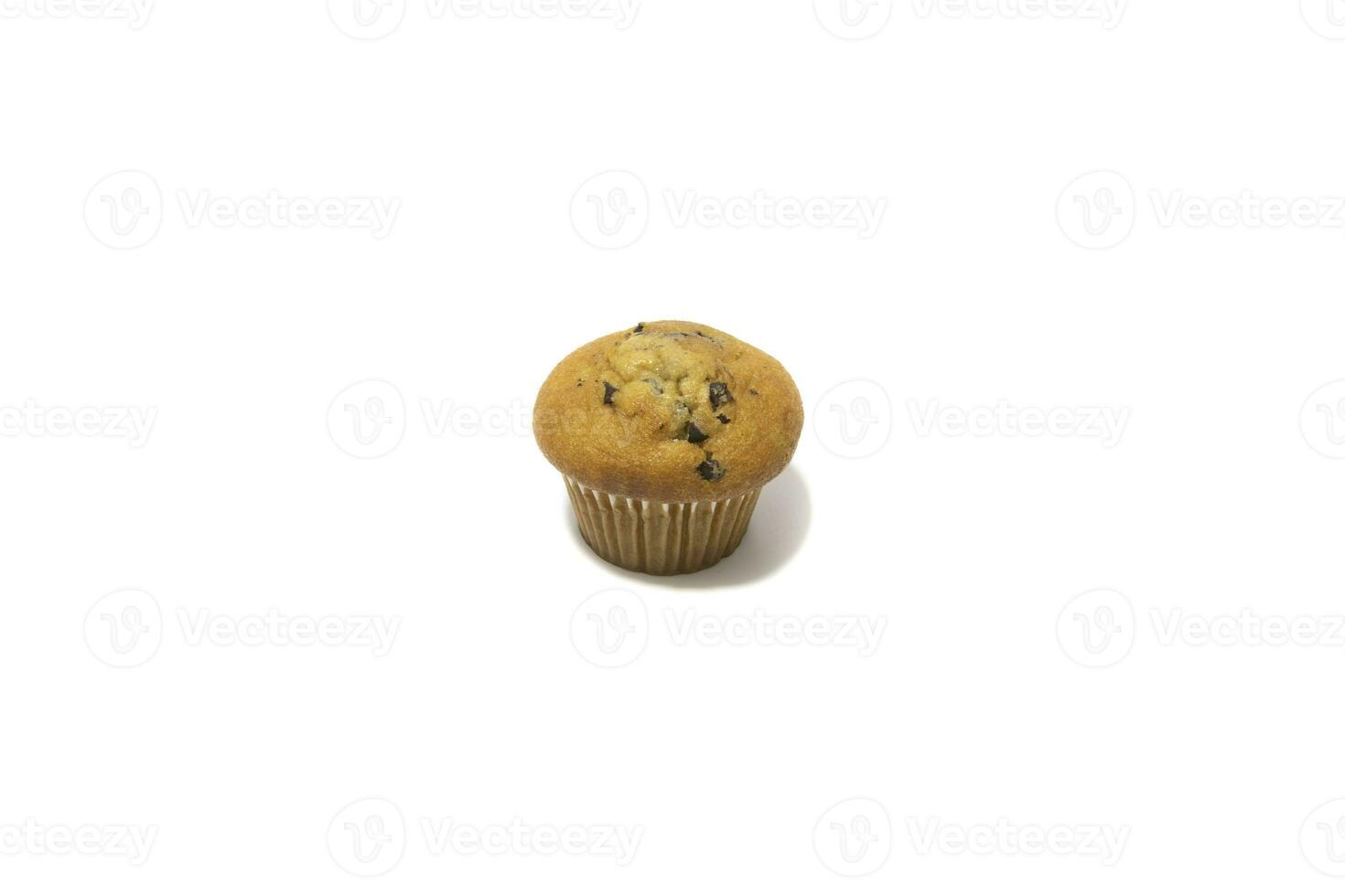 Muffins with chocolate flecks isolated on a white background. Muffins are made mainly from wheat flour, egg, vegetable oil, cow's milk, baking powder, essence ,vanilla being the most common, and sugar photo