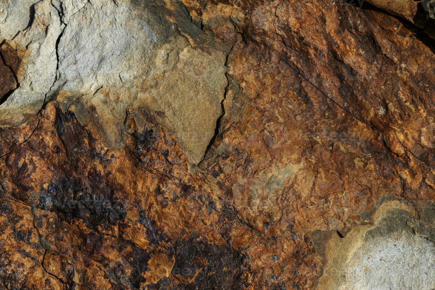 Background of a stone and metal texture. The perfect combination of strength and elegance. photo