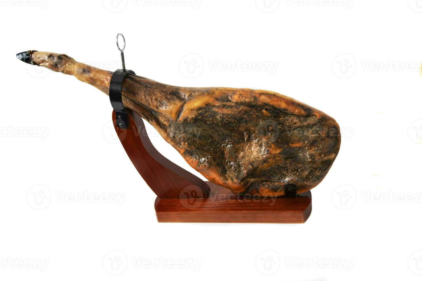 A leg of Iberian serrano ham isolated on white background. Iberian 