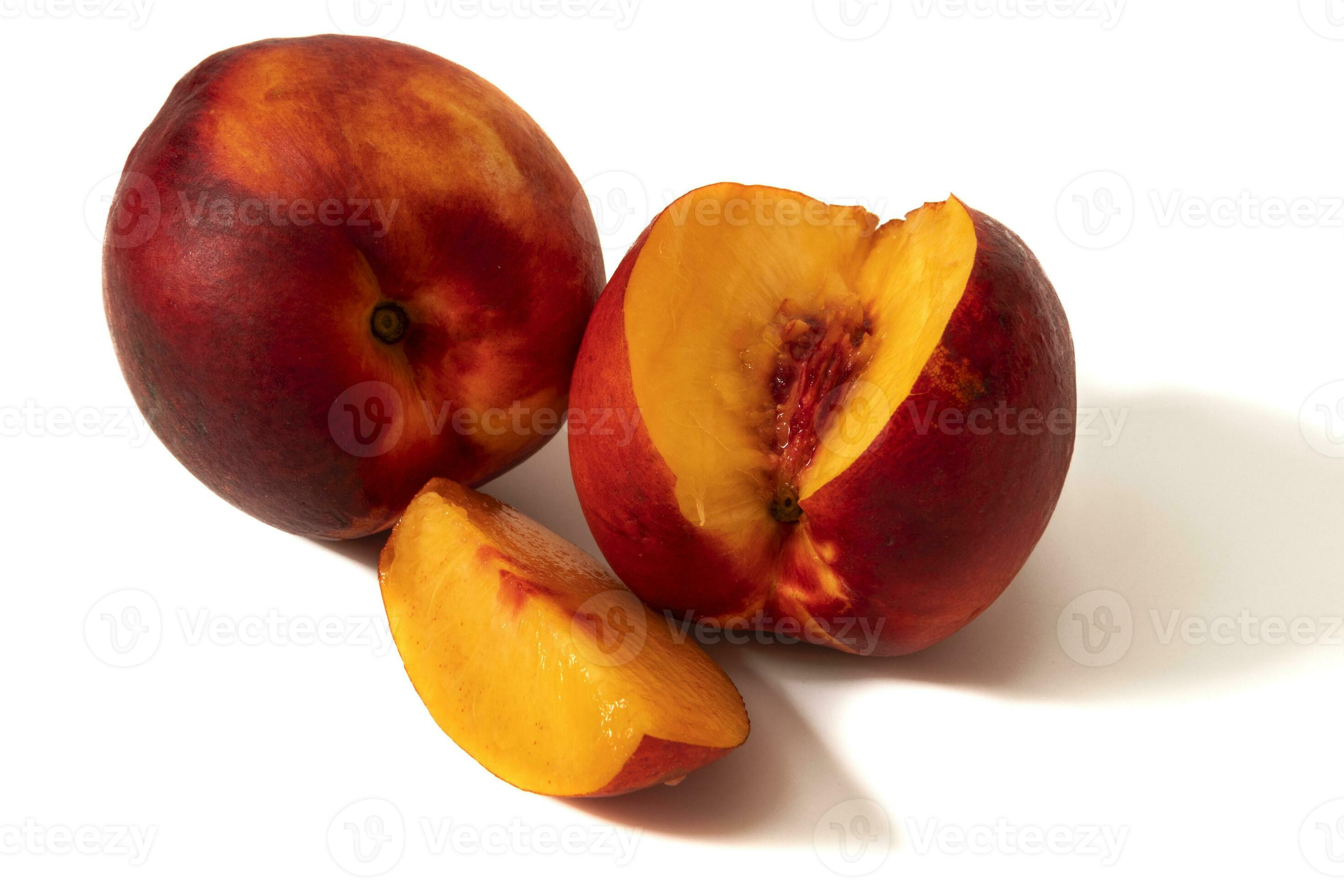 Nectarines isolated on white background. A nectarine is a variety of