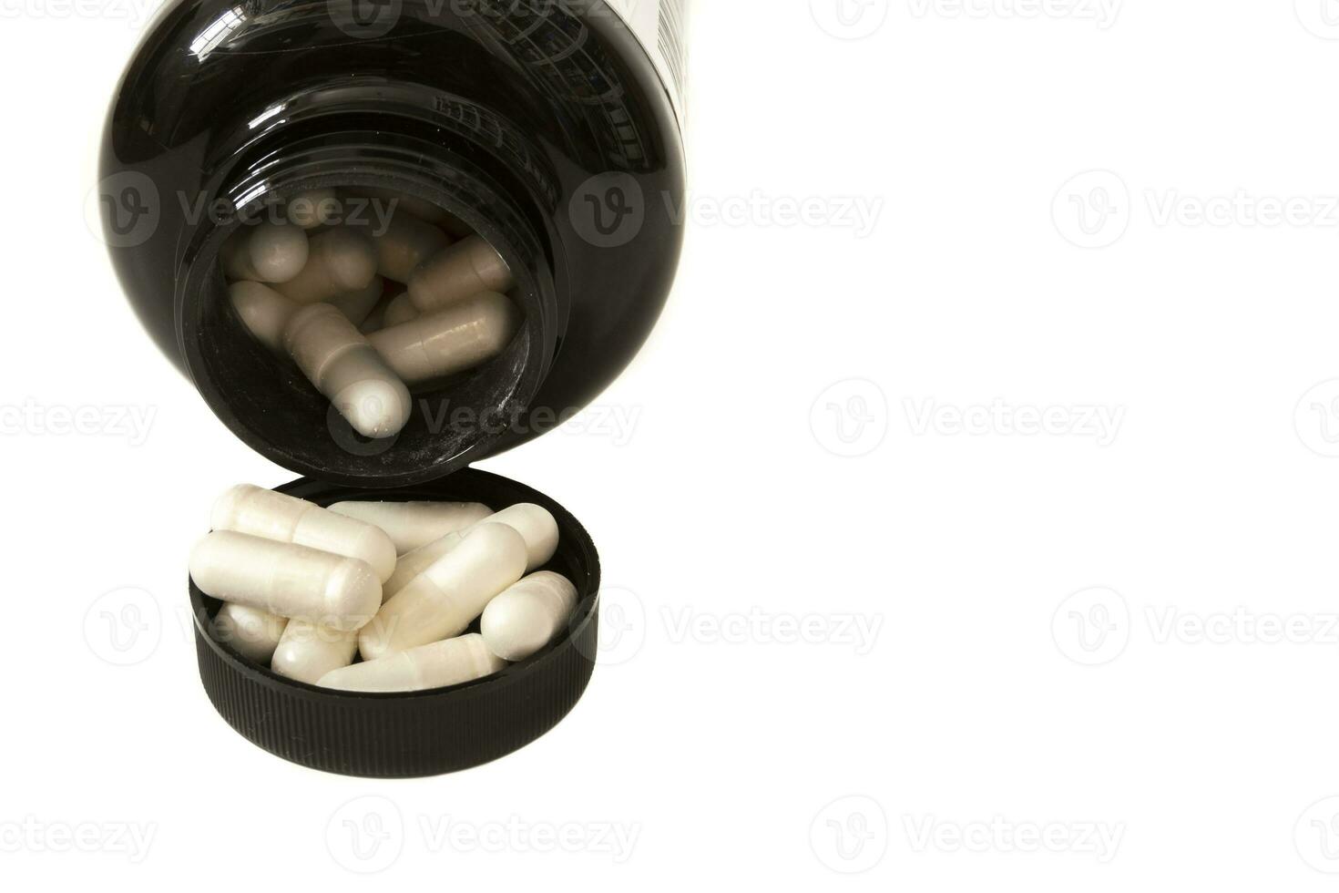 A bottle of magnesium citrate capsules. Isolated on white background. A dietary supplement that provides a highly absorbable form of magnesium and may be beneficial for bone and muscle health. photo