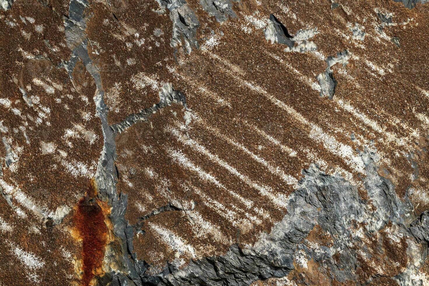 Background of a stone and metal texture. The perfect combination of strength and elegance. photo
