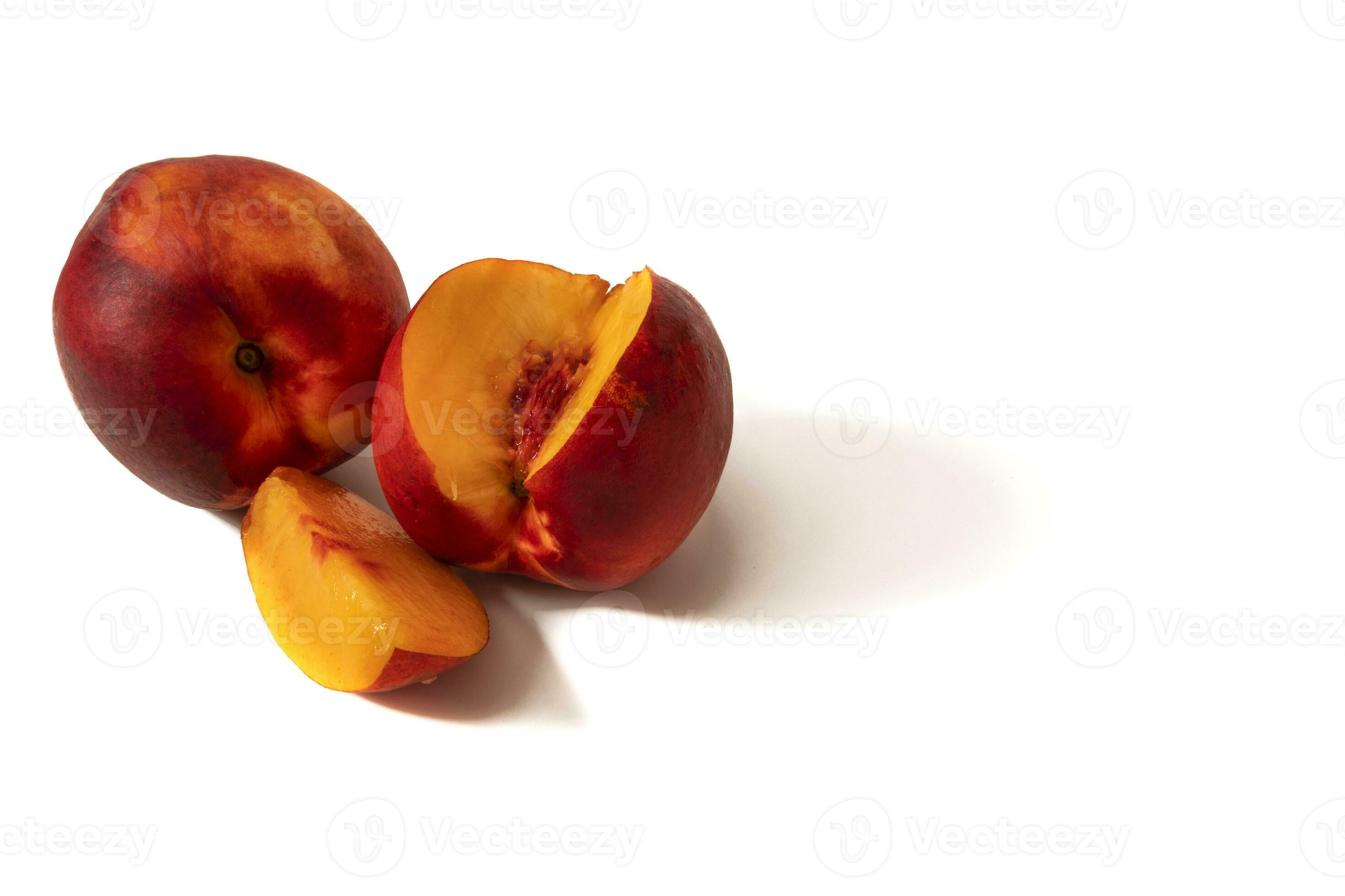 Nectarines isolated on white background. A nectarine is a variety of