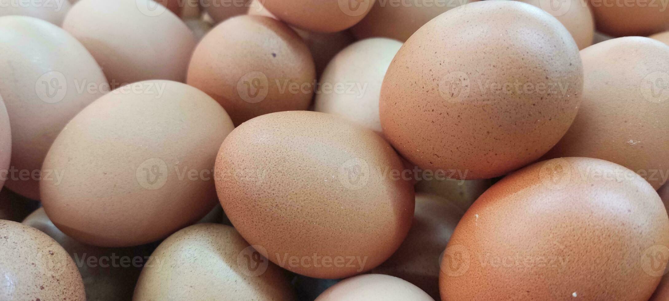 background of fresh eggs for sale at a market photo