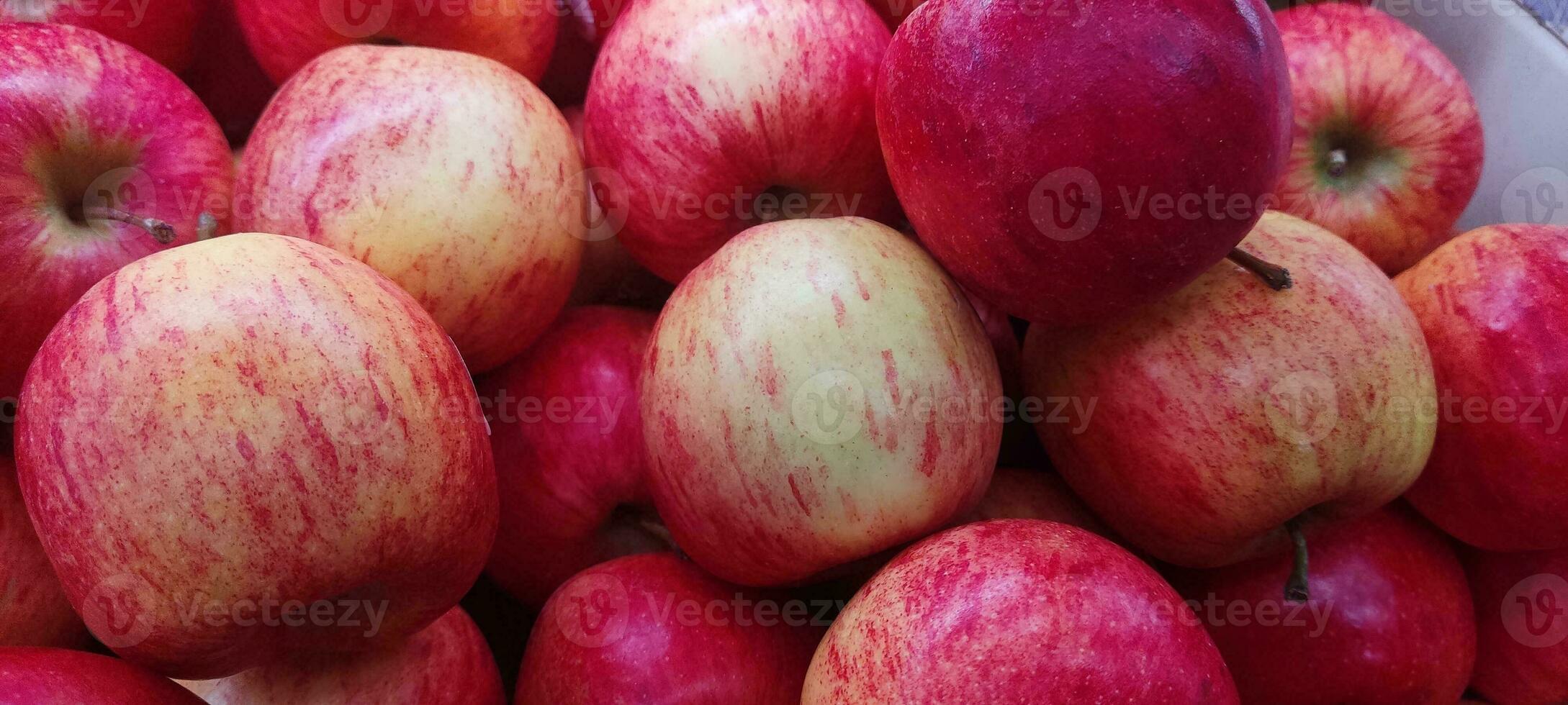 Lots of red apples. Tasty and juicy. Background of apples photo