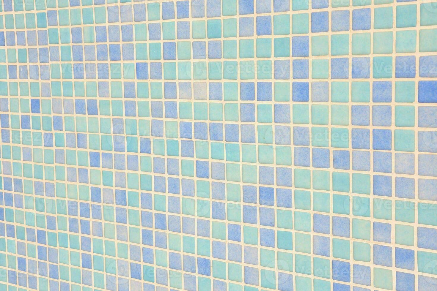 a blue and white tile wall with squares photo