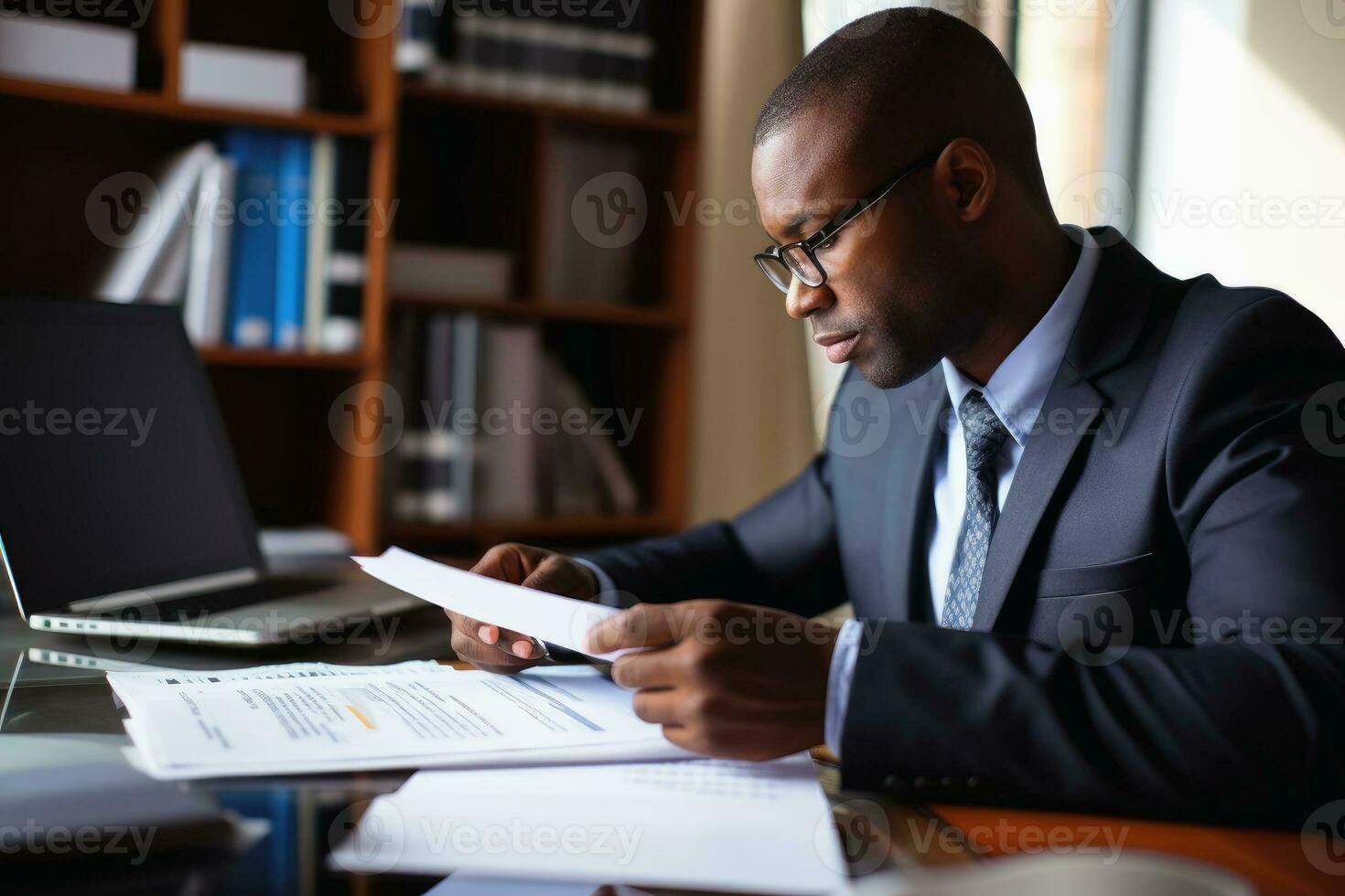 A tax consultant at work at his desk.AI generative photo