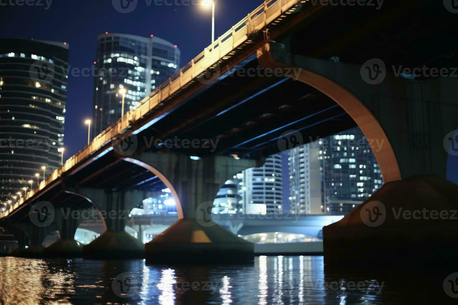 A low angle nightshot of a bridge with a skyline in the background.AI generative photo