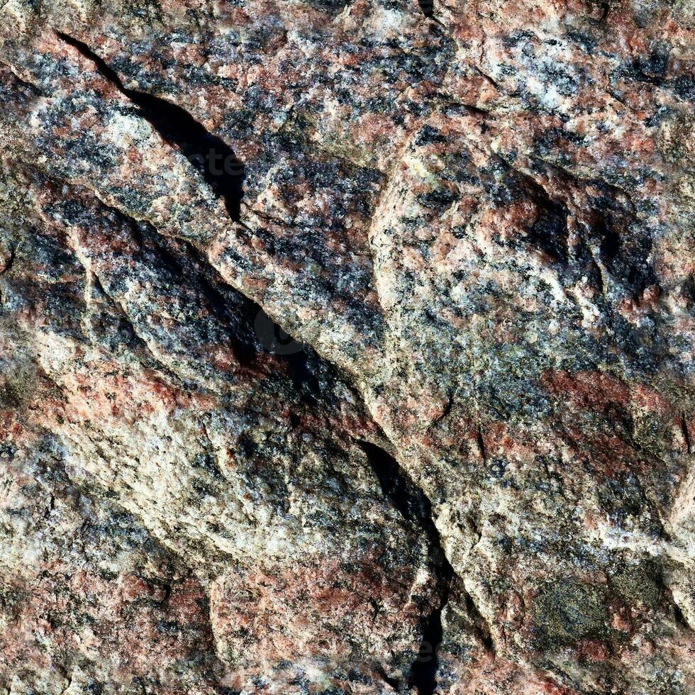 Photo realistic seamless texture pattern of granite stone walls in high resolution..