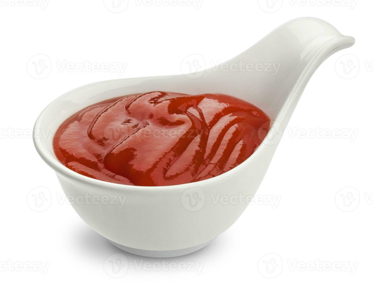 Bowl of ketchup isolated on white background photo