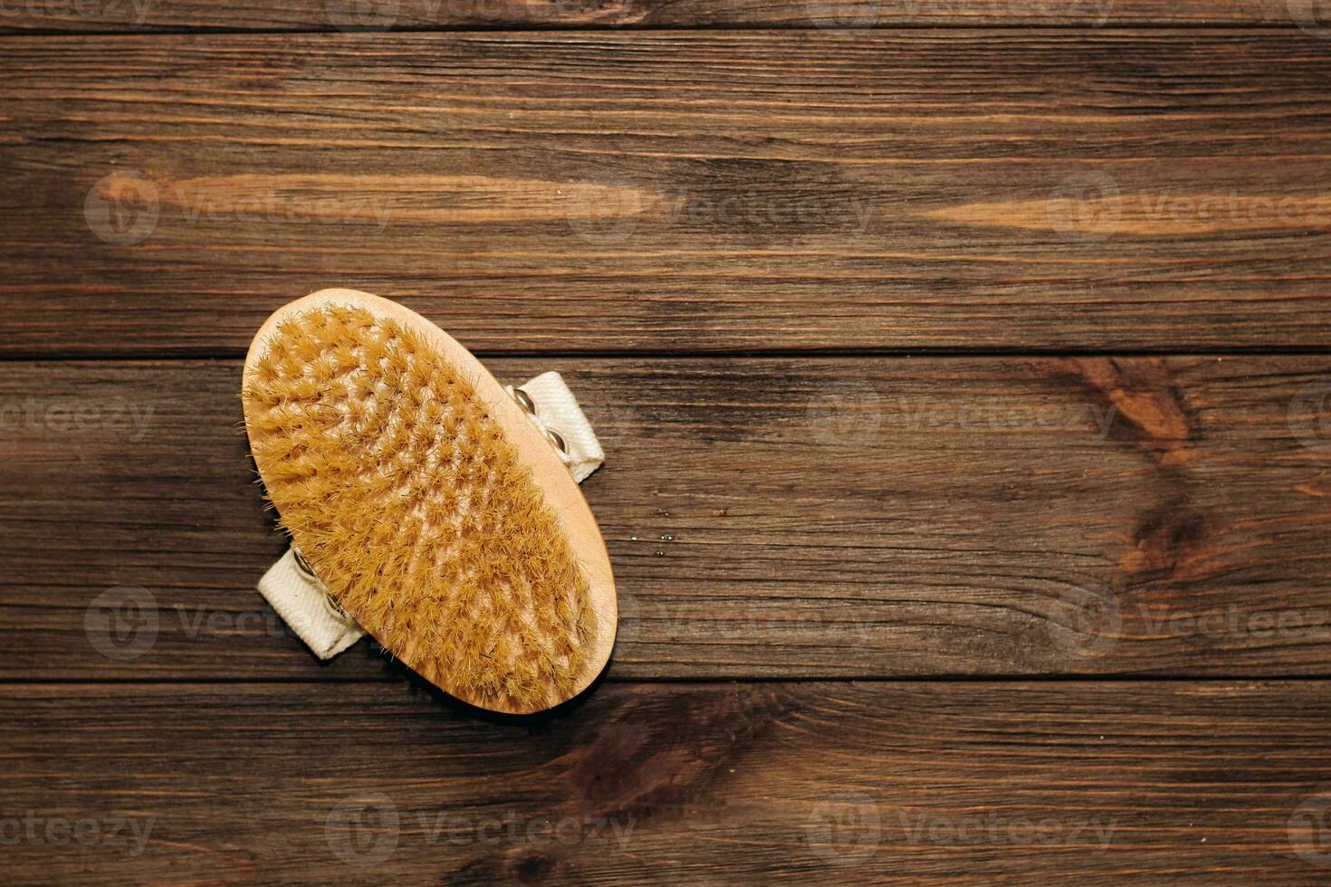 Massage wooden brush for dry massage against cellulite. photo