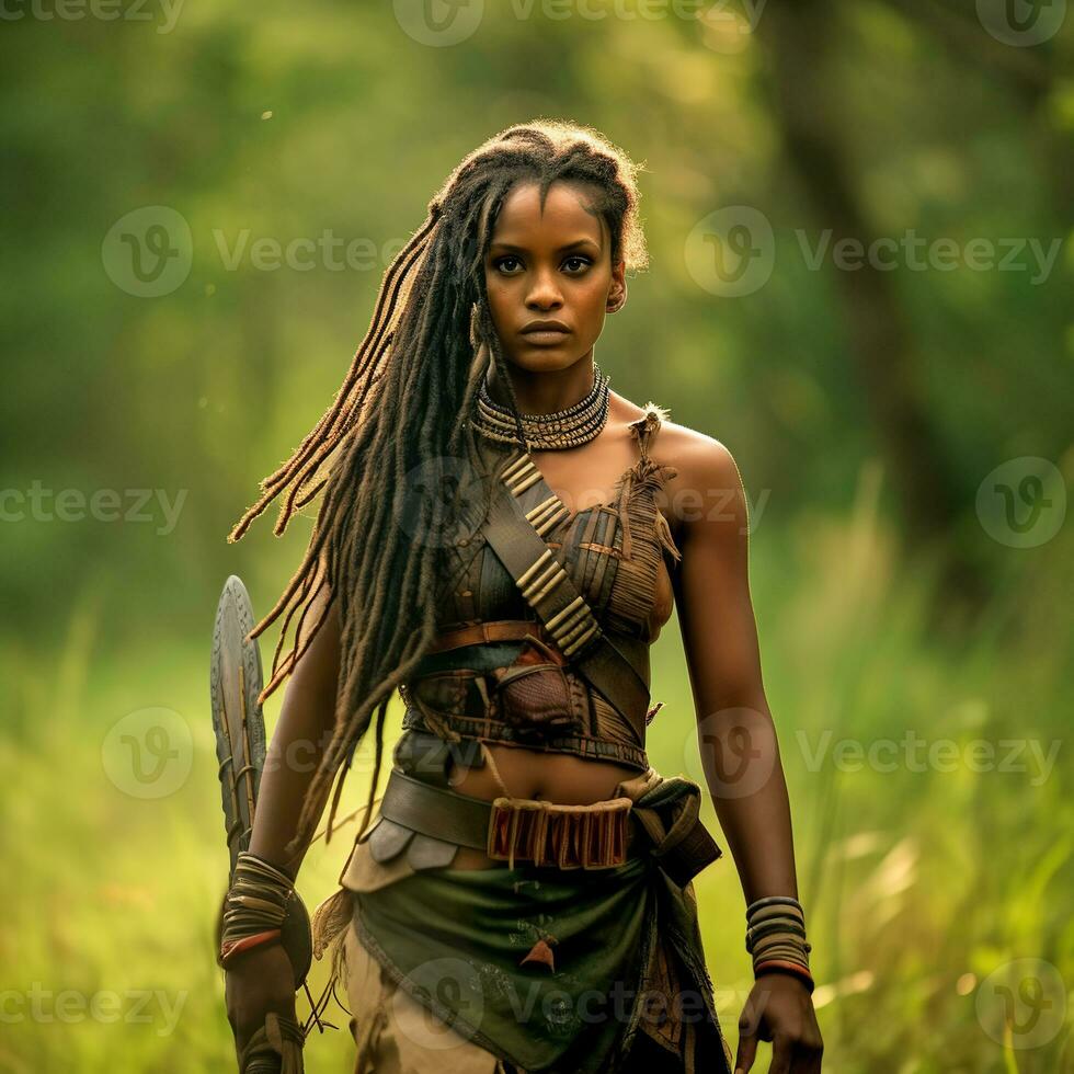 A woman with tribal outfit, leather top and skirt, adorned with multiple necklaces and bracelets, holding a spear and a shield in a lush green forest - Ai Generative photo