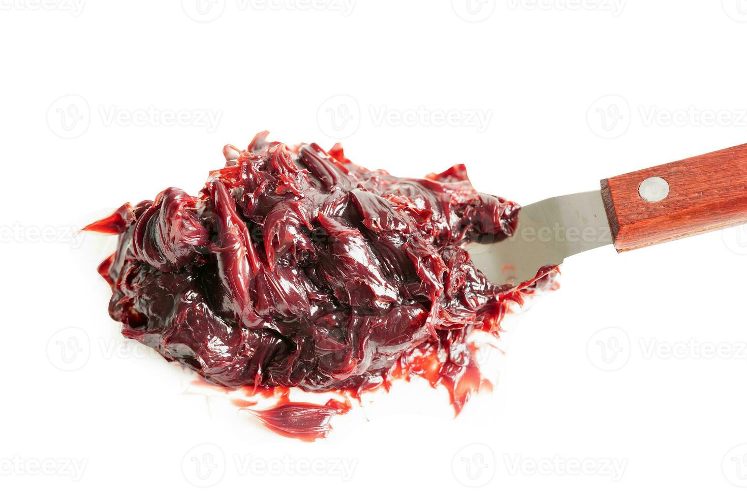 Grease isolated on white background with clipping path, red excellent water resistance synthetic lithium complex. photo