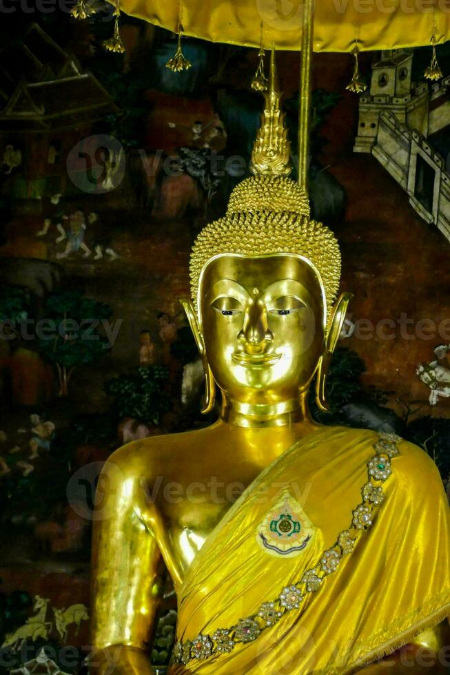 A golden Buddha photo