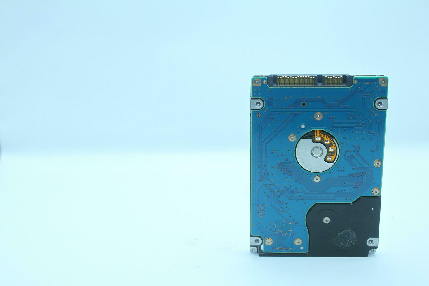 Hard disk drive isolated on a white background. Computer hardware technology. photo