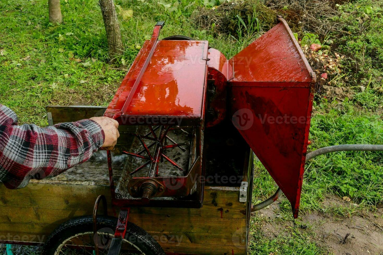 Red metal woodchipper photo
