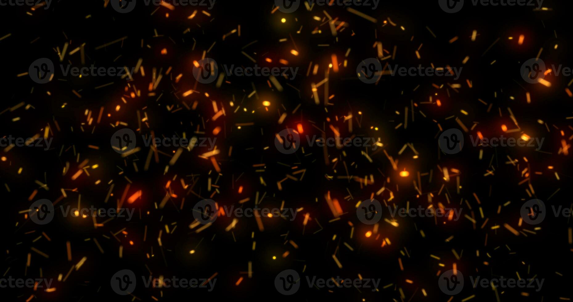 Abstract glowing yellow orange flying sparks from campfire background photo