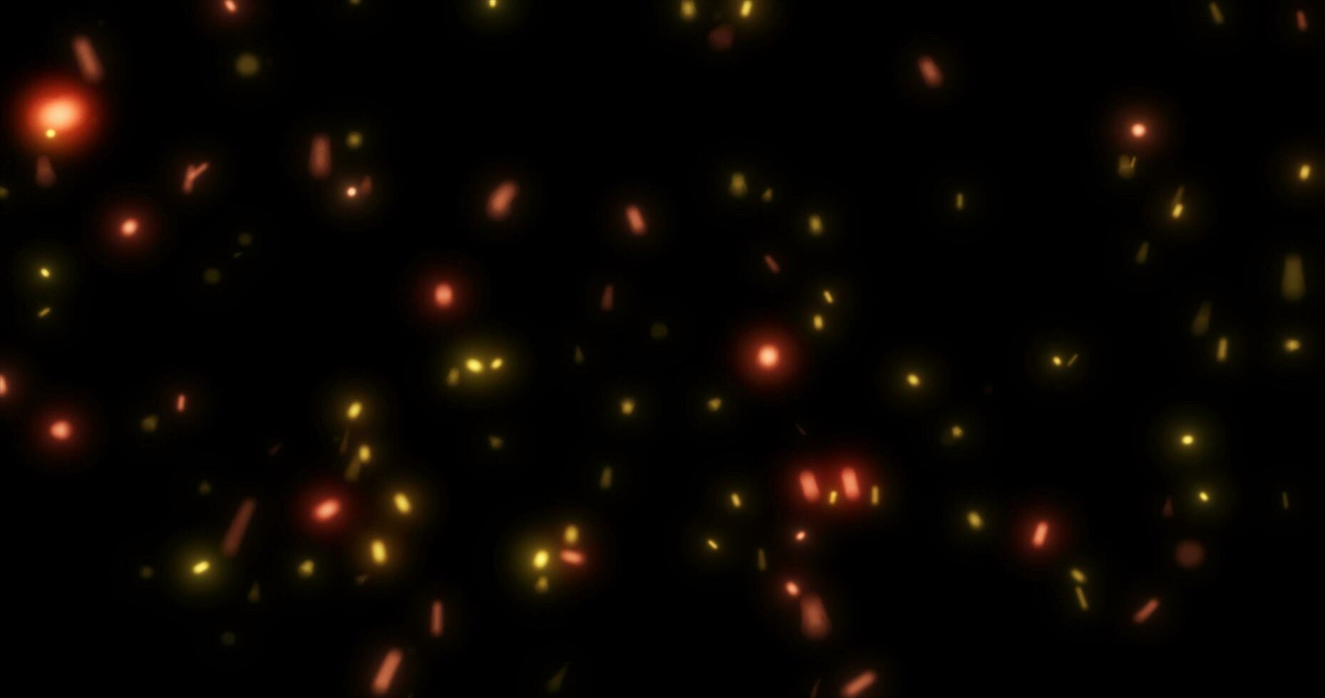 Abstract bright background of flying yellow glowing orange fire sparks from a fire on a black background photo