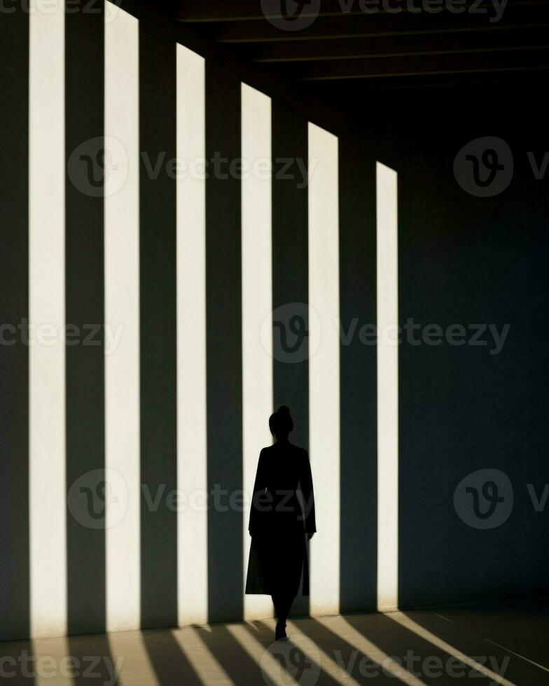 A graceful descent, shadows caress her figure, as she glides down the stairway, framed by a minimalist wall. Generative AI photo