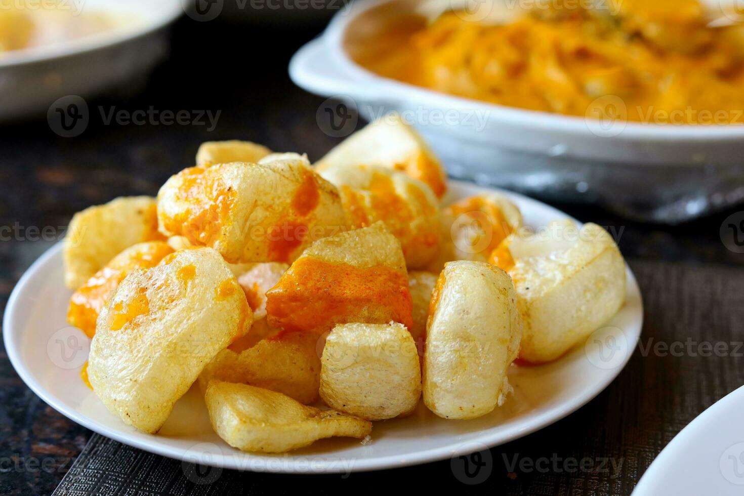 Rambak, jangek or kerupuk kulit is an Indonesian traditional crackers. It is made from the skin of cow, served with curry sauce - delicious and tasty photo