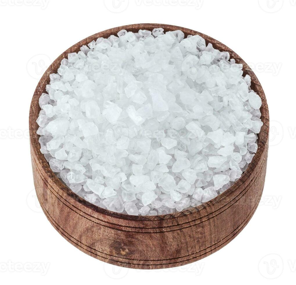 Sea salt isolated on white background photo