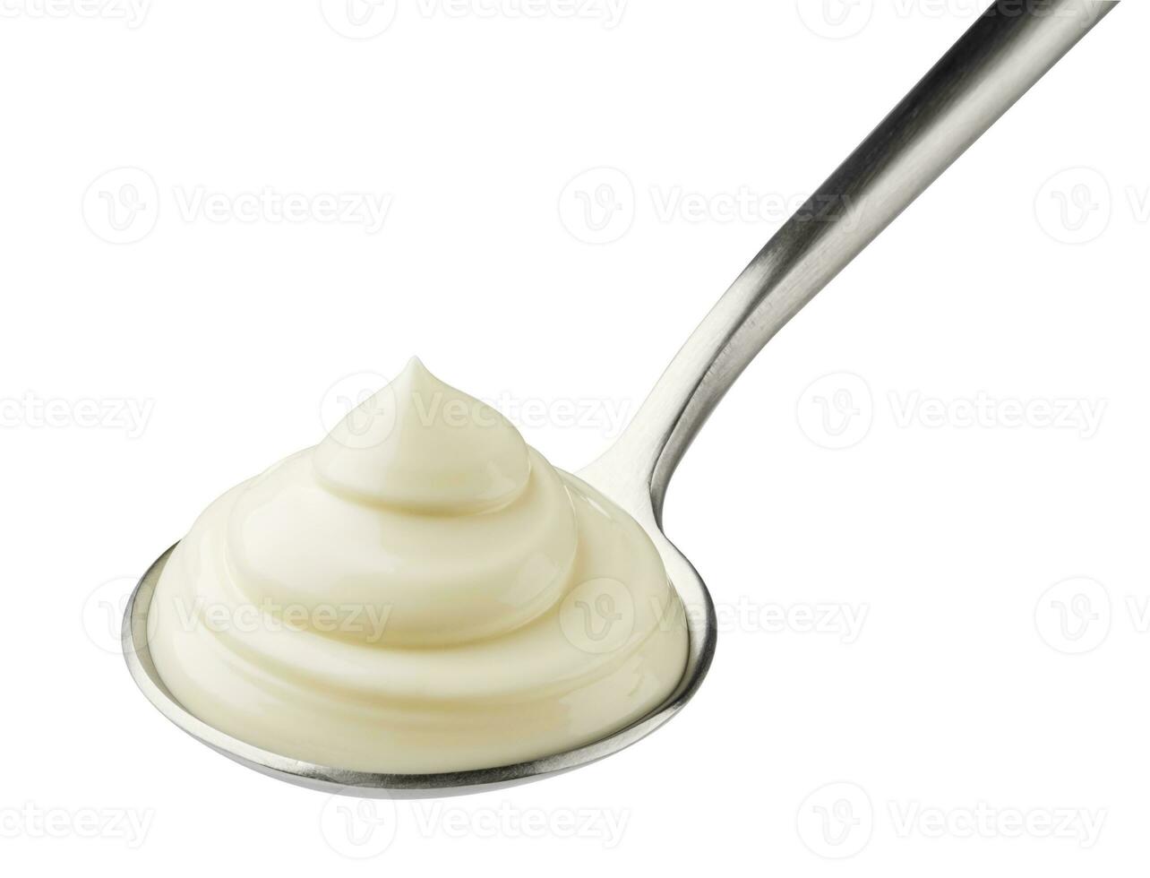 Mayonnaise in spoon isolated on white background photo
